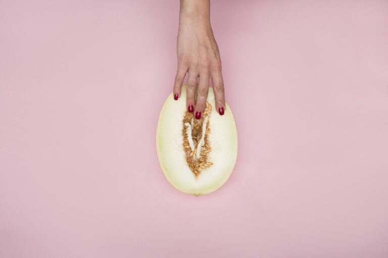 Person Holding a Sliced Melon